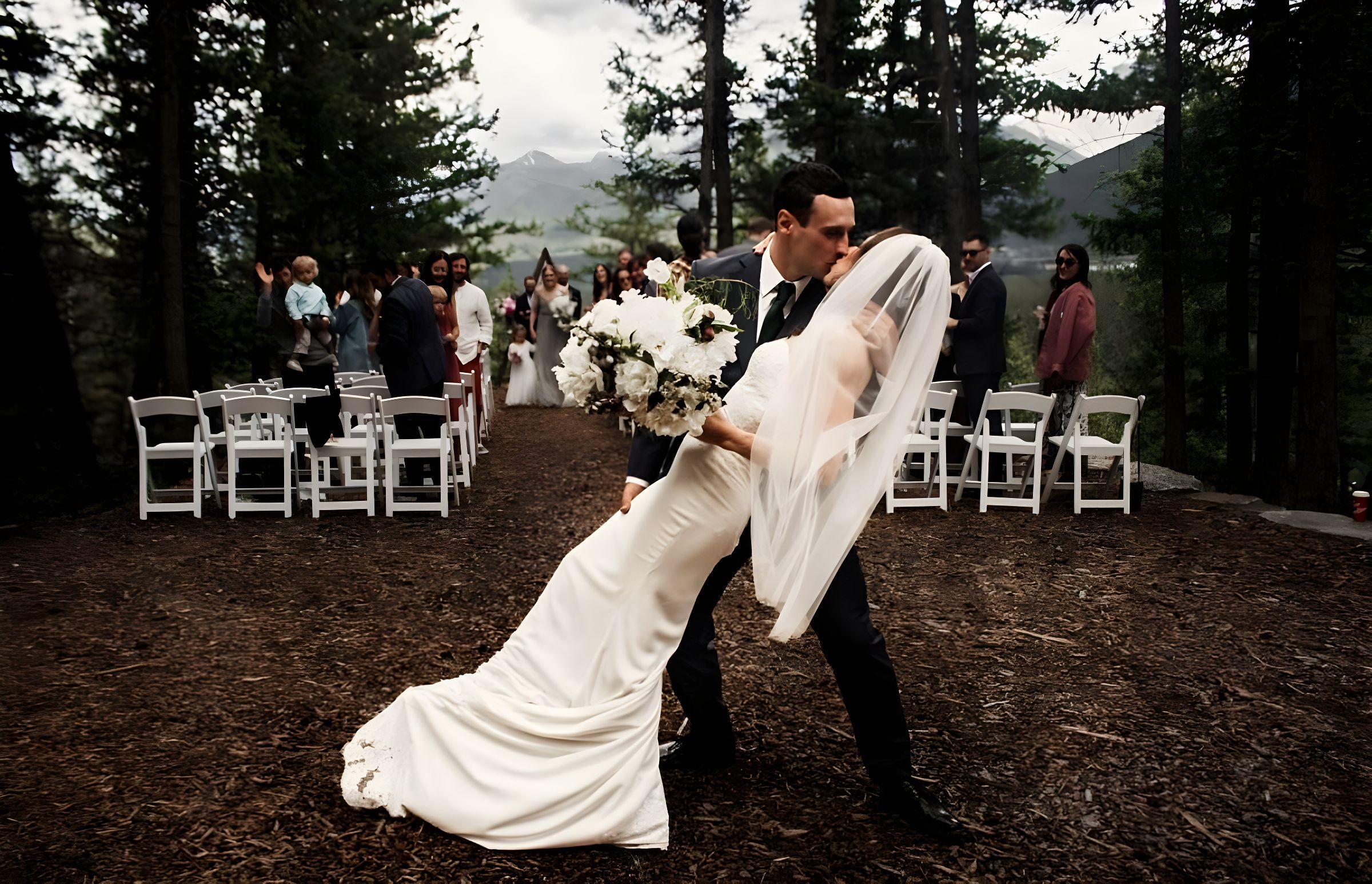 The first kiss at the forest ceremony, bouquet in hand